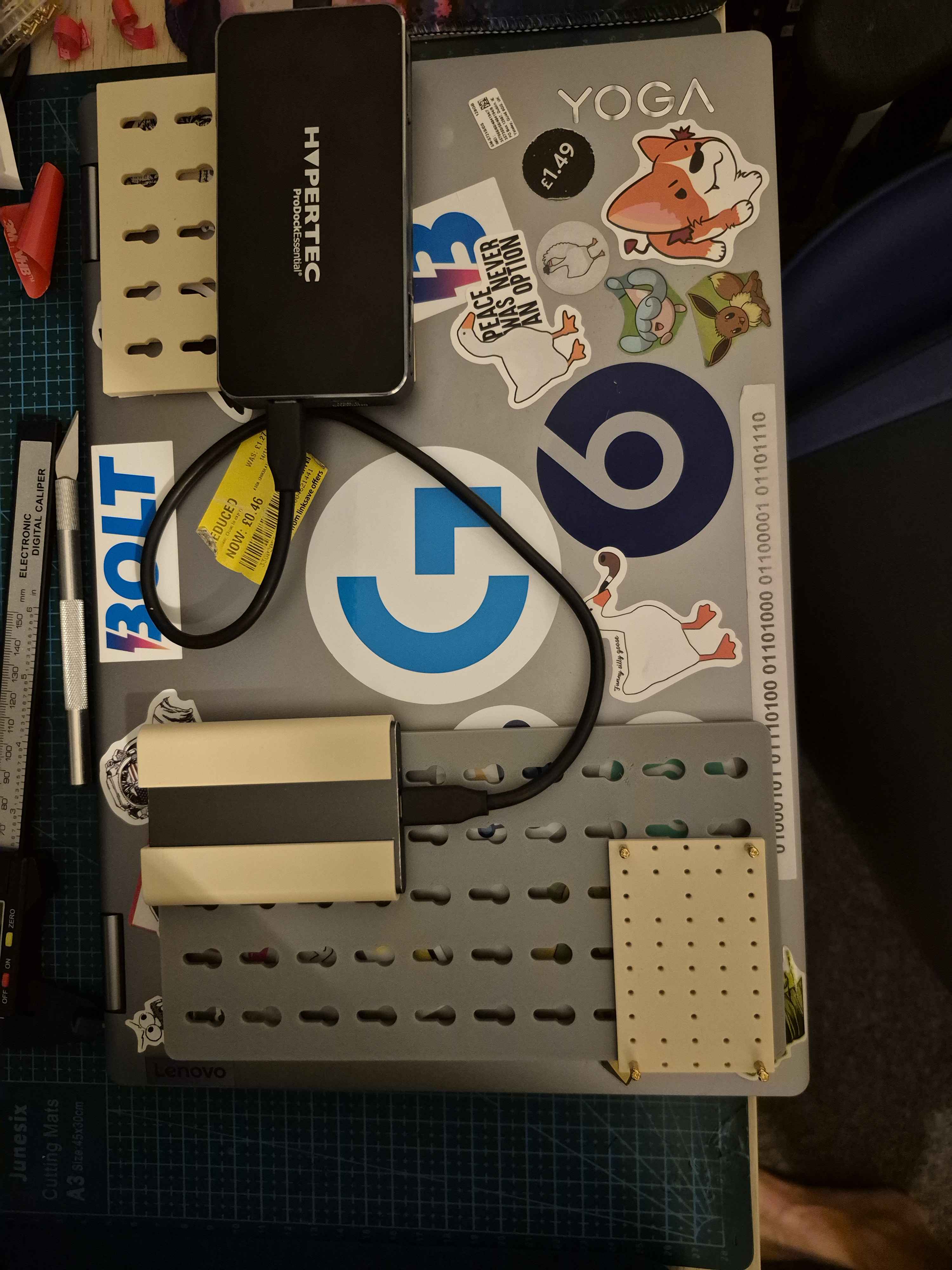 E-Shell attachment system fitted to the back of a laptop